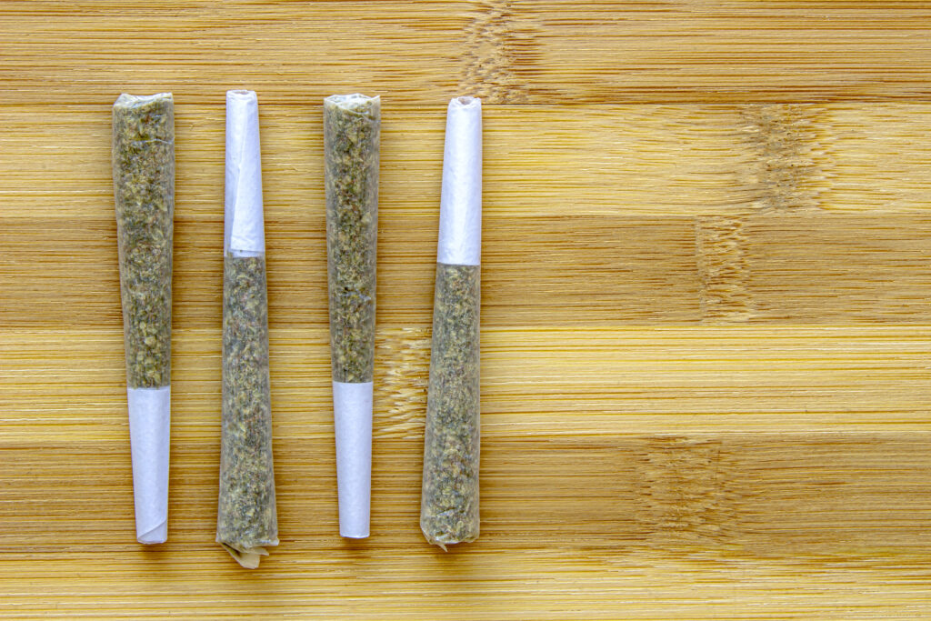 The word 'pre-roll' comes from the idea of a 'pre-rolled joint'. But shouldn't it just be called a roll or a joint? Of course someone pre-rolled it. (Adobe Stock)