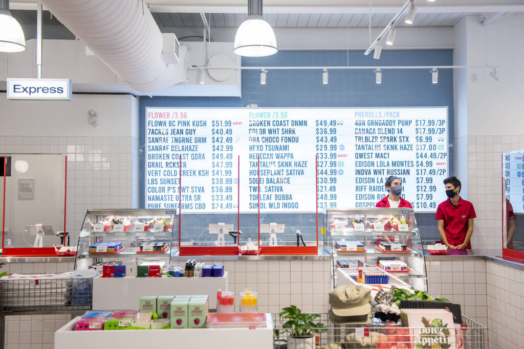a retail store with vintage colours and a weed menu