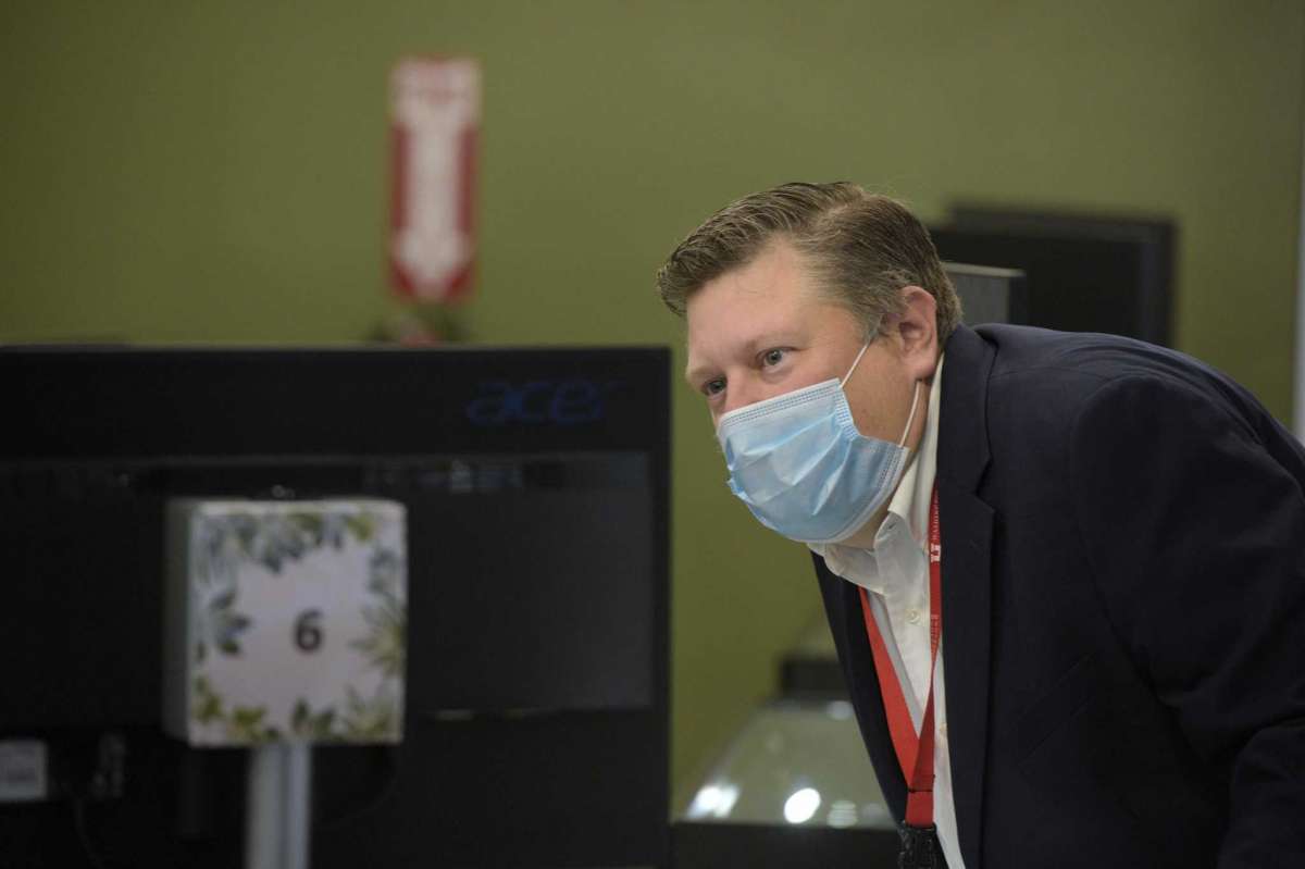 Al Domeika, head pharmacist, during the opening ceremony for The Botanist, the new medical marijuana dispensary, on Mill Plain Road. Wednesday morning. October 13, 2021, in Danbury, Conn.