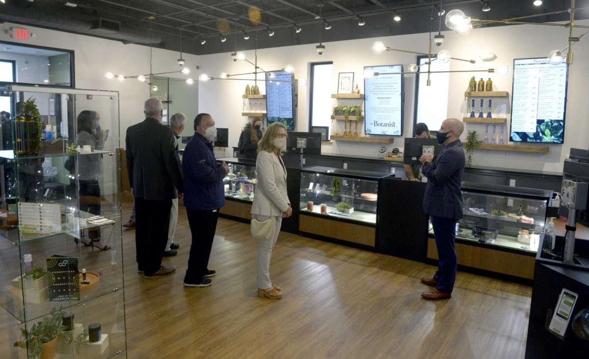Carl Tirella, right, Acreage Holdings's general manager in Connecticut, gives a tour during the opening ceremony for The Botanist, the new medical marijuana dispensary, on Mill Plain Road. The Botanist is owned by Acreage Holdings. Wednesday morning. October 13, 2021, in Danbury, Conn.