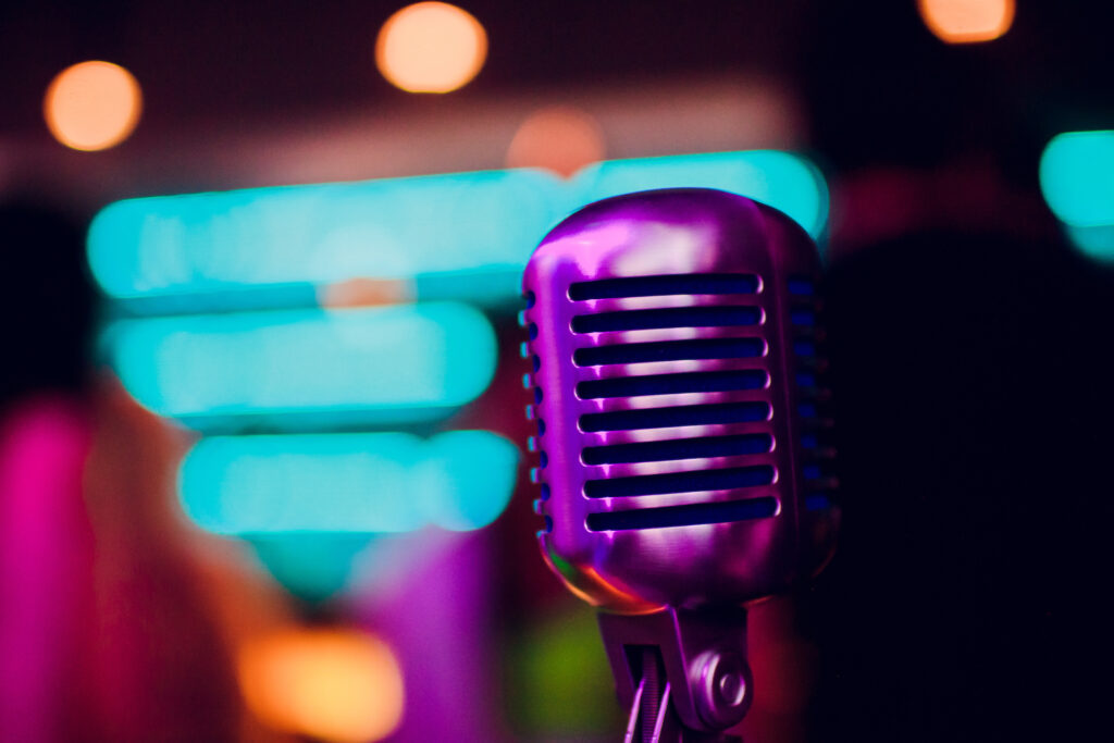 microphone on a stand up comedy stage with reflectors ray, high contrast image