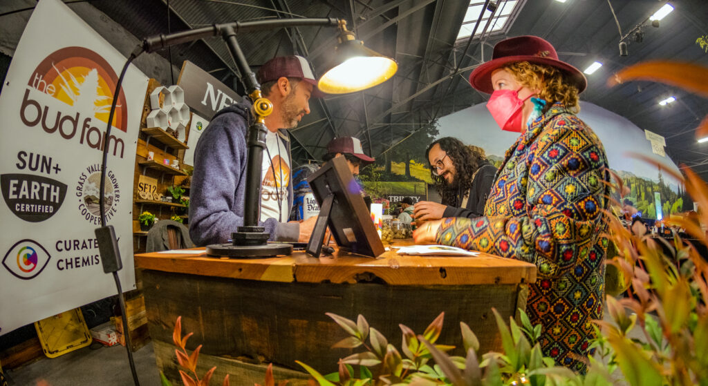 A legacy Cali pot farmer sales his wares at The Emerald Cup 2021. (Photo by James Sakert, Courtesy The Emerald Cup)