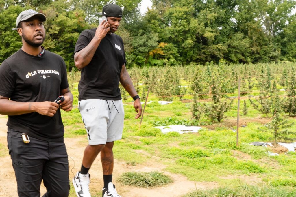 Jarrel Howard and Al Harrington stroll along Gold Standard Farms in Martin, Tennessee.